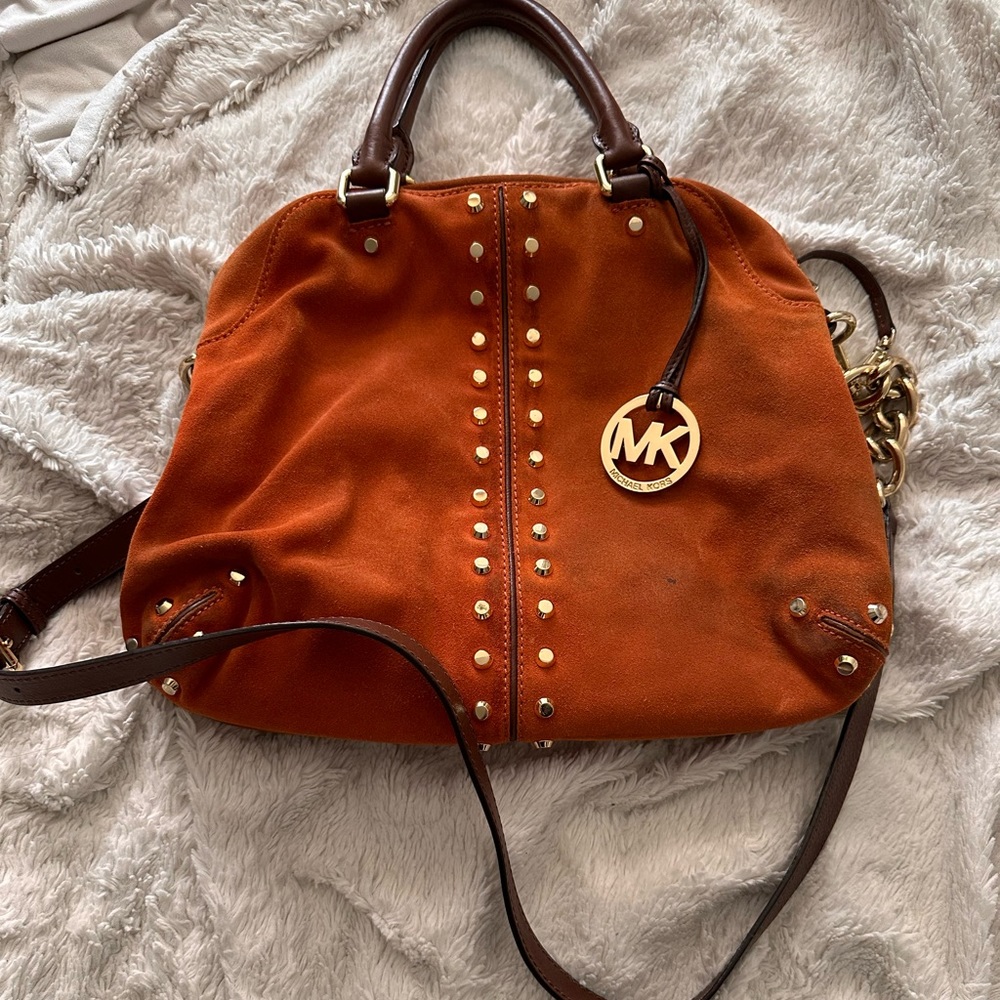 Burnt orange Michael Kors bag with gold and brown leather accents
